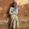 african girl sat on wall_ar08